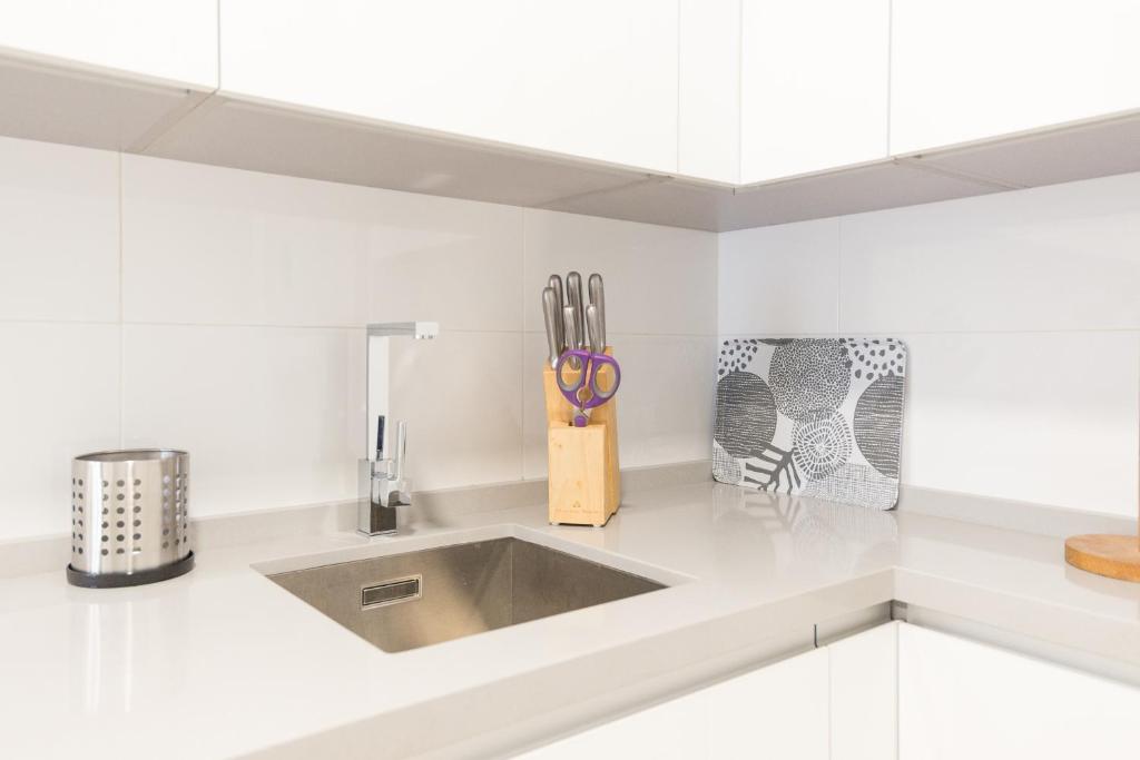 Kuchyňa alebo kuchynka v ubytovaní Homemalaga Álamos Luxury