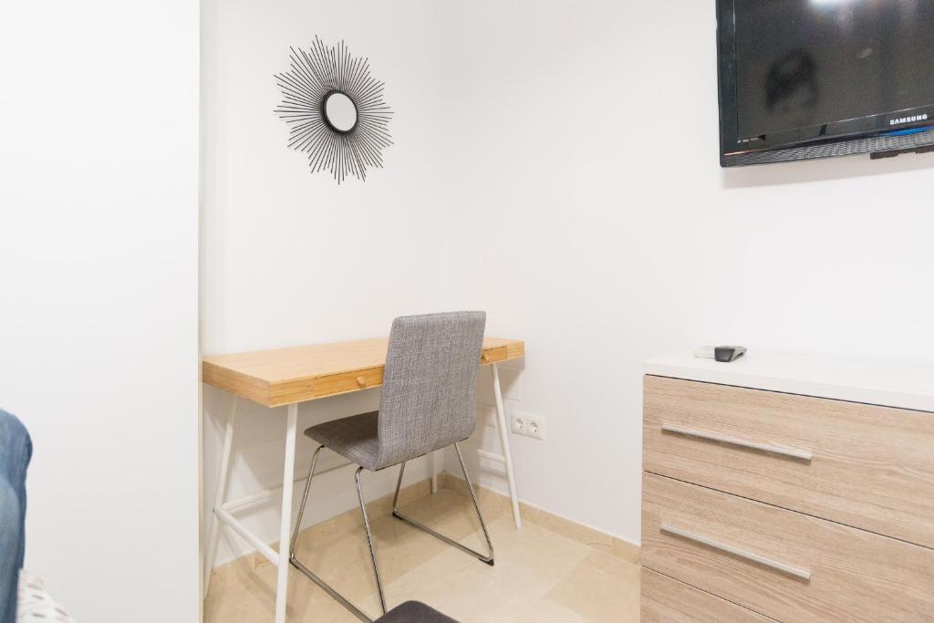 Televízia a/alebo spoločenská miestnosť v ubytovaní Homemalaga Álamos Luxury