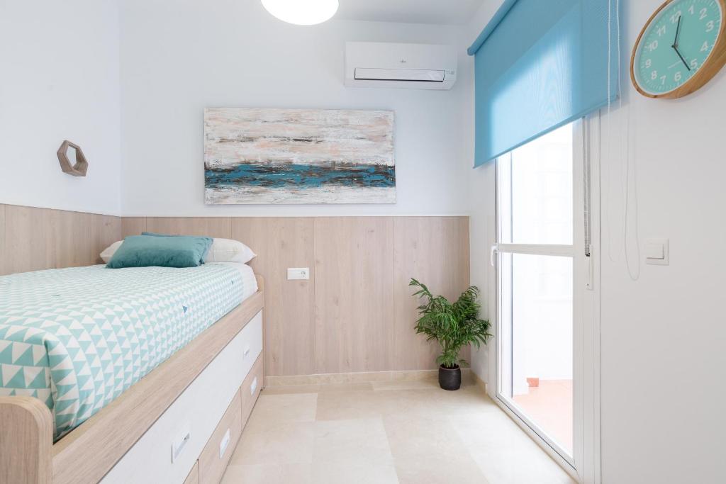 Posteľ alebo postele v izbe v ubytovaní Homemalaga Álamos Luxury