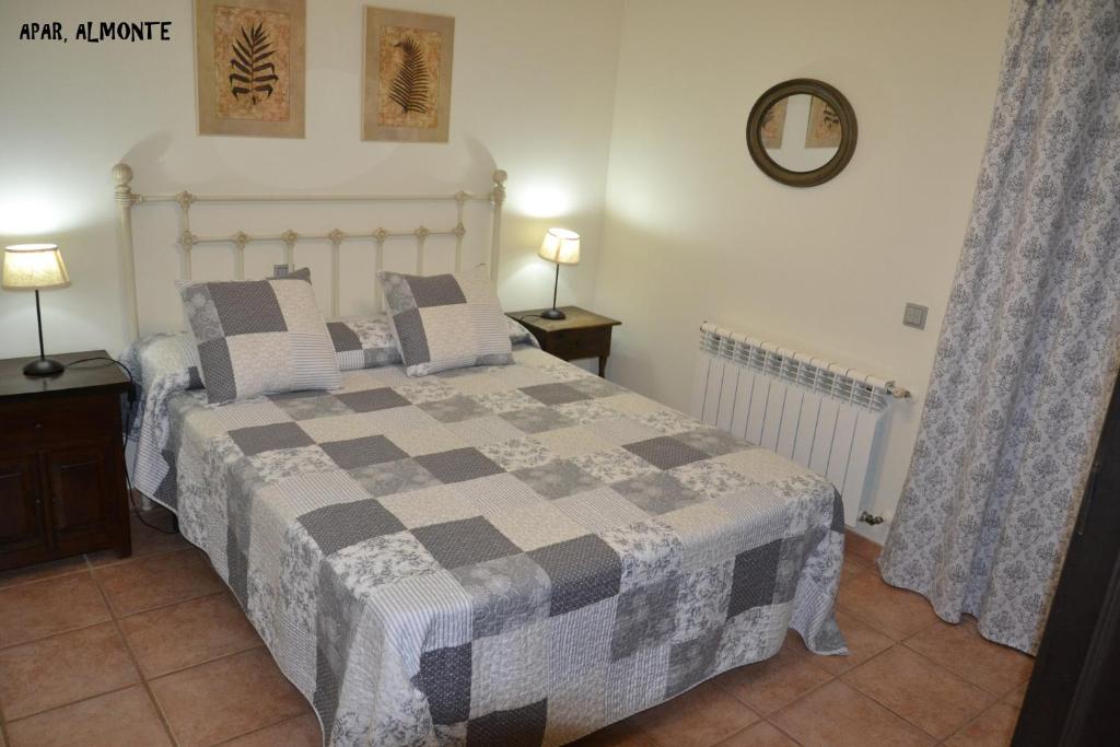 Cama o camas de una habitación en Apartamentos Rurales Natura