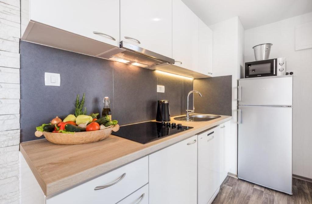 Kuchyň nebo kuchyňský kout v ubytování Brugor Mobil Homes Lavanda