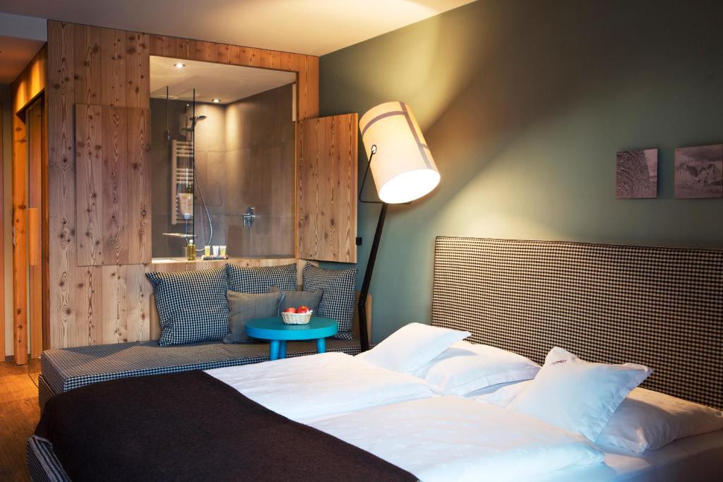 Postel nebo postele na pokoji v ubytování ICARO Hotel