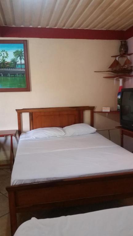 Postel nebo postele na pokoji v ubytování Hotel BAHÍA