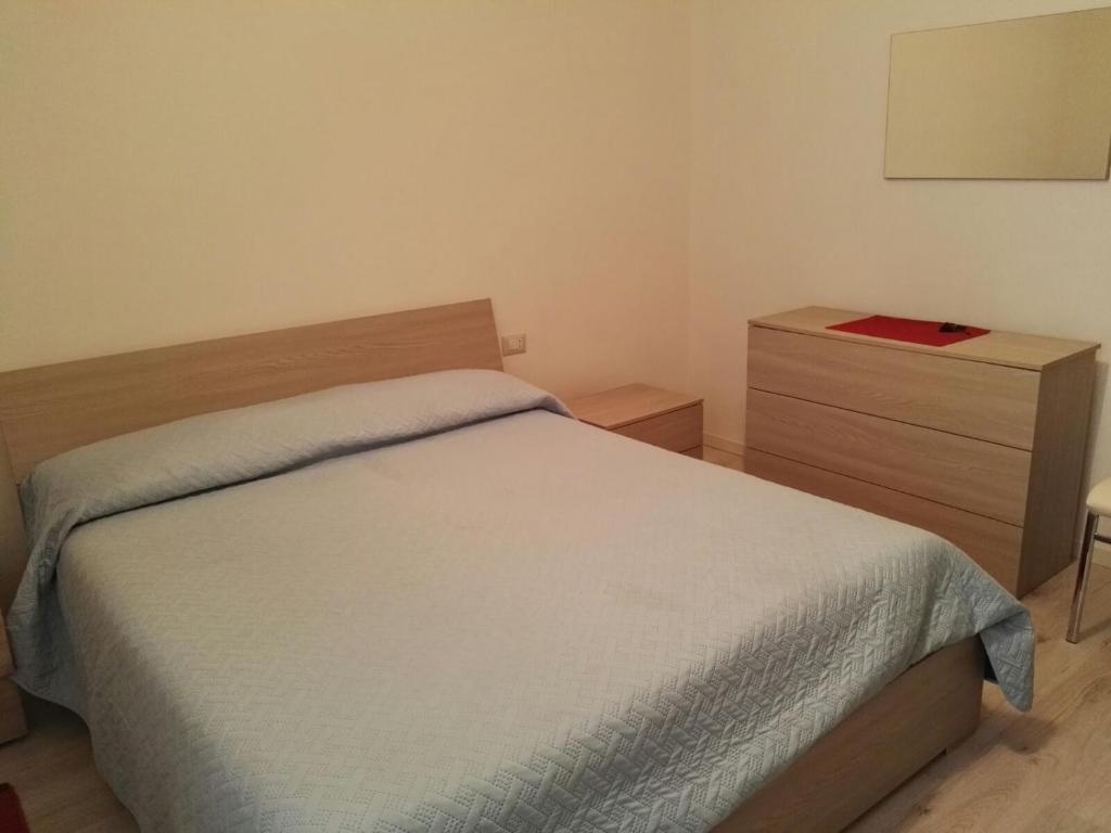 Postel nebo postele na pokoji v ubytování Sa Domu e Muru