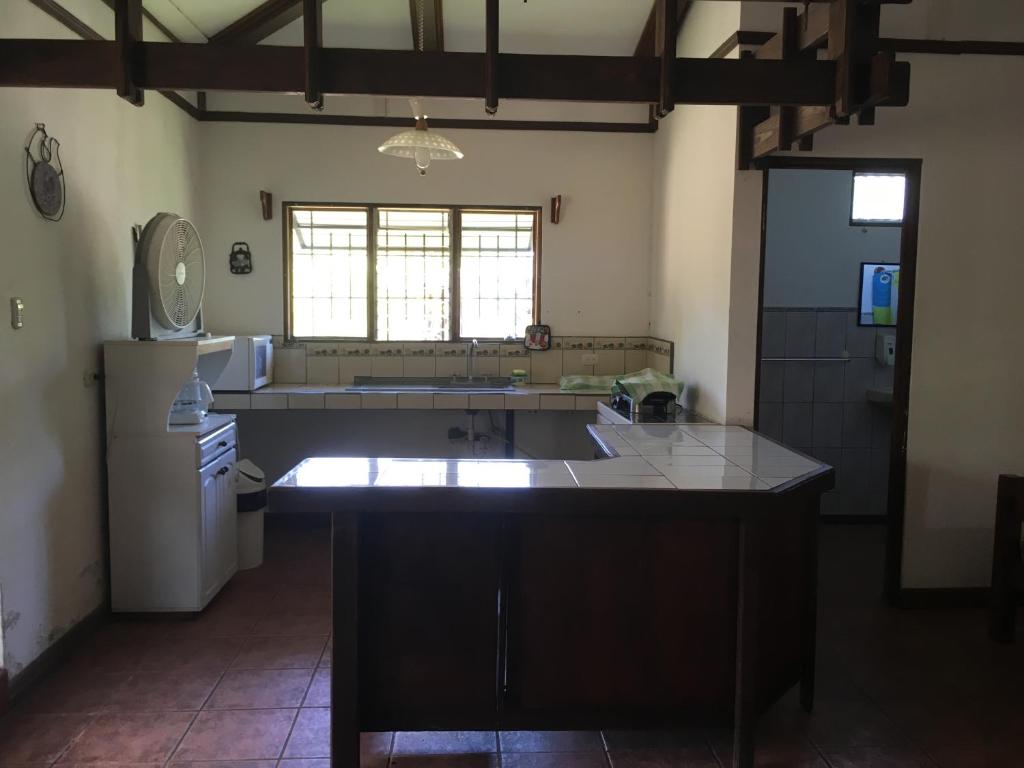 Kuchyň nebo kuchyňský kout v ubytování Tiquisia Lodge