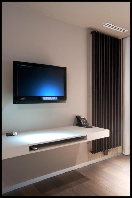 TV a/nebo společenská místnost v ubytování Hotel Shamrock
