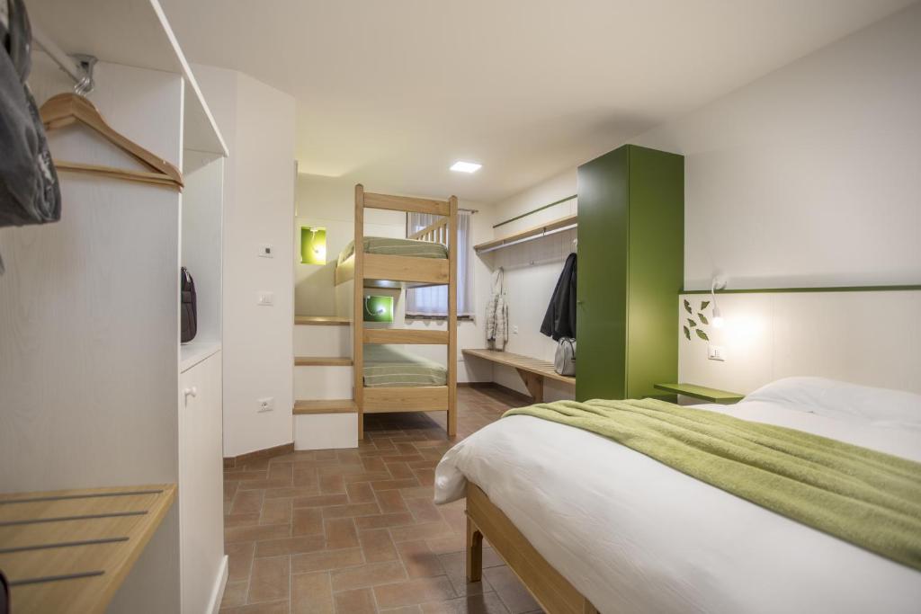 Postel nebo postele na pokoji v ubytování Agriturismo Cjargnei