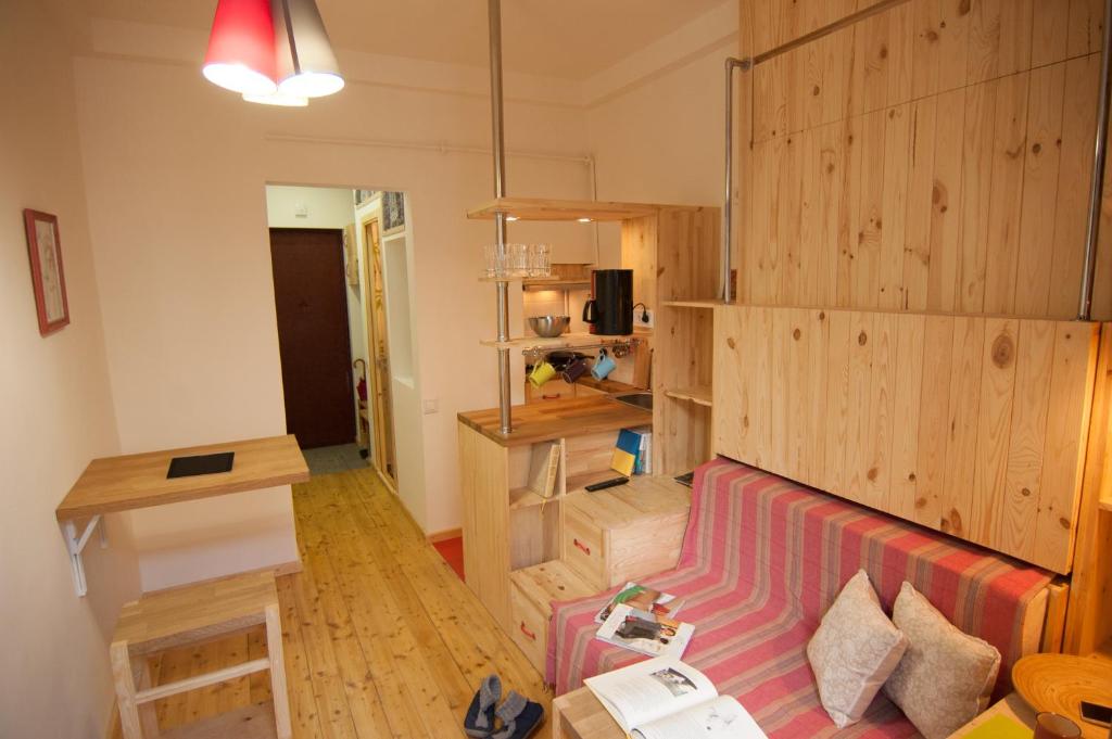 Фото A cozy wooden studio in a heart of Kharkiv