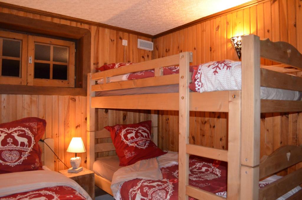 Postel nebo postele na pokoji v ubytování Rev2chalet