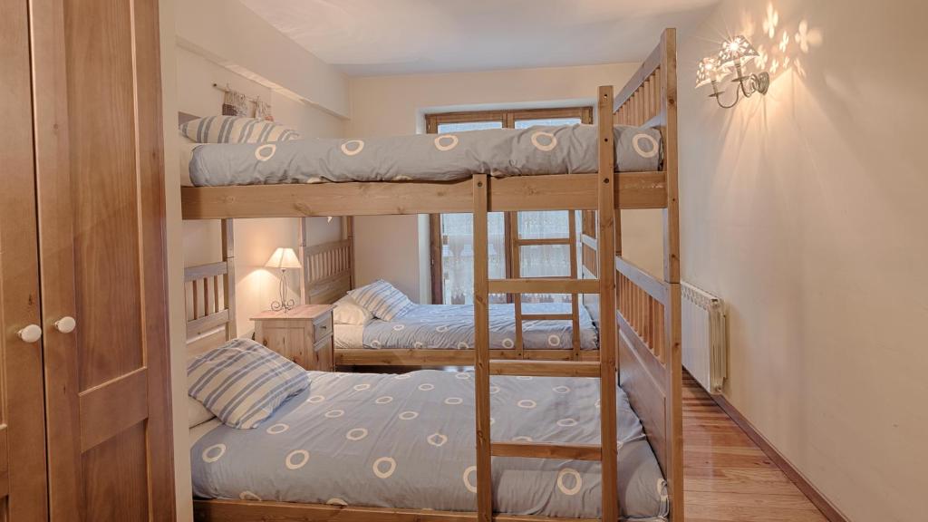 Postel nebo postele na pokoji v ubytování Saplan Real Estate PLETA NHEU