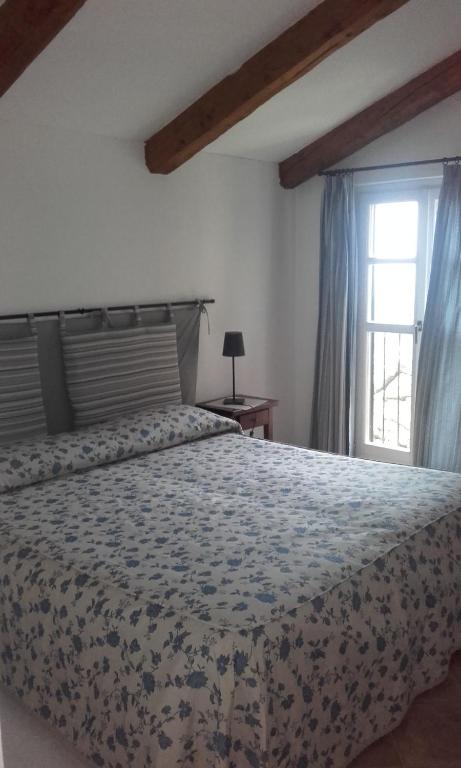 Postel nebo postele na pokoji v ubytování Agriturismo Cascina Barin
