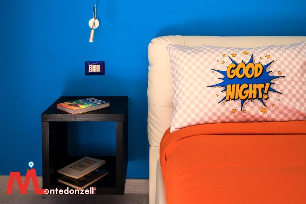 Łóżko lub łóżka w pokoju w obiekcie Montedonzelli B&B