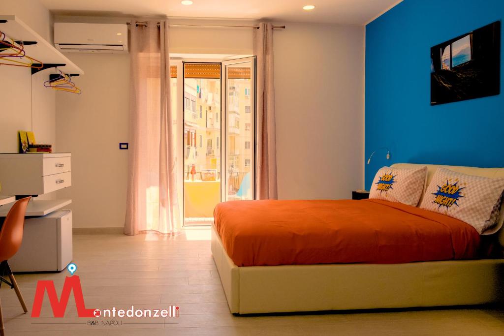 Łóżko lub łóżka w pokoju w obiekcie Montedonzelli B&B