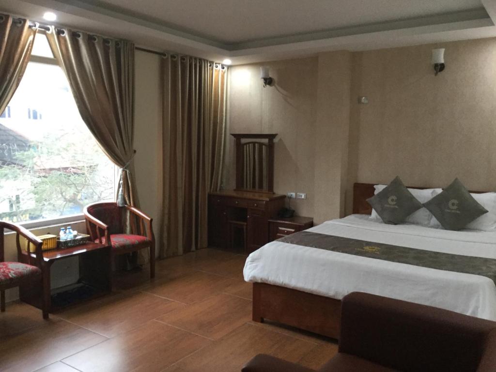 Postel nebo postele na pokoji v ubytování Chio Hotel