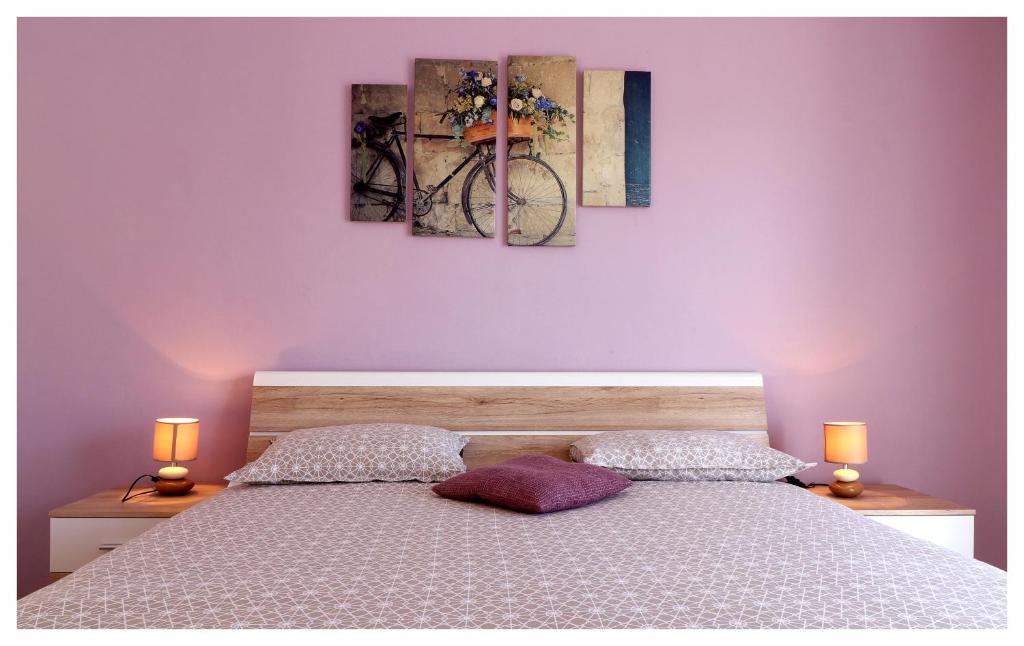 Postel nebo postele na pokoji v ubytování Apartment Rozika