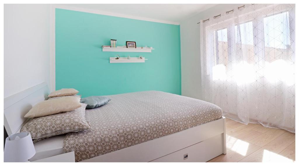 Postel nebo postele na pokoji v ubytování Apartment Rozika