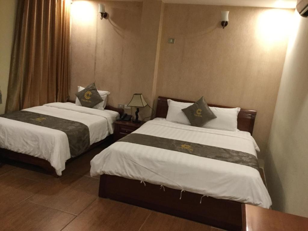 Postel nebo postele na pokoji v ubytování Chio Hotel
