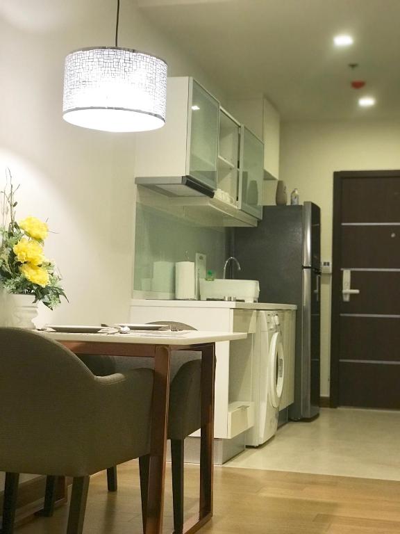 Kuchyň nebo kuchyňský kout v ubytování Astra Suites Central