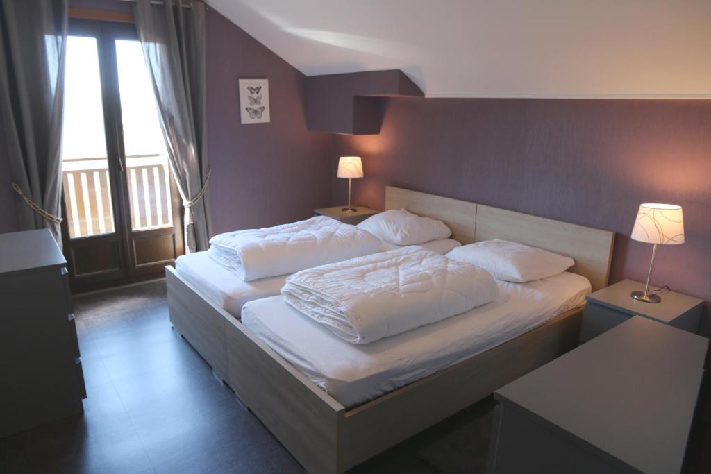 Katil atau katil-katil dalam bilik di Chalet Beau Regard