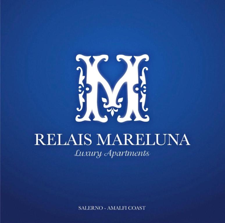 a letter m logo in white on a blue background at Relais Mareluna - Luxury Apartments in Salerno