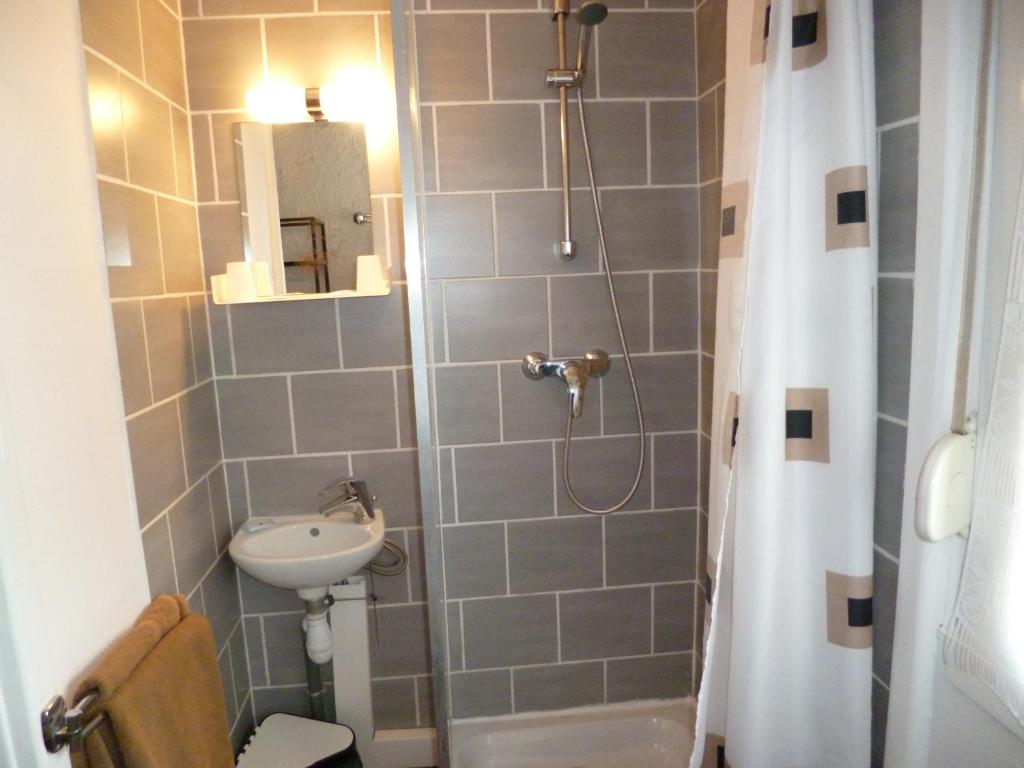 Koupelna v ubytování Hôtel le Calypso