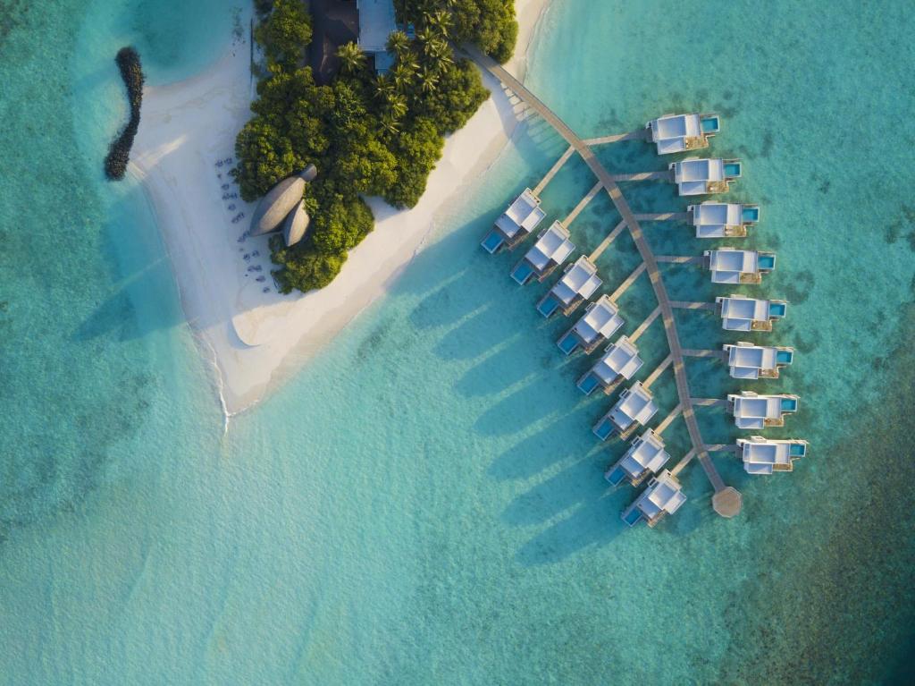an aerial view of a island in the ocean at Dhigali Maldives - A Premium All-Inclusive Resort in Raa Atoll