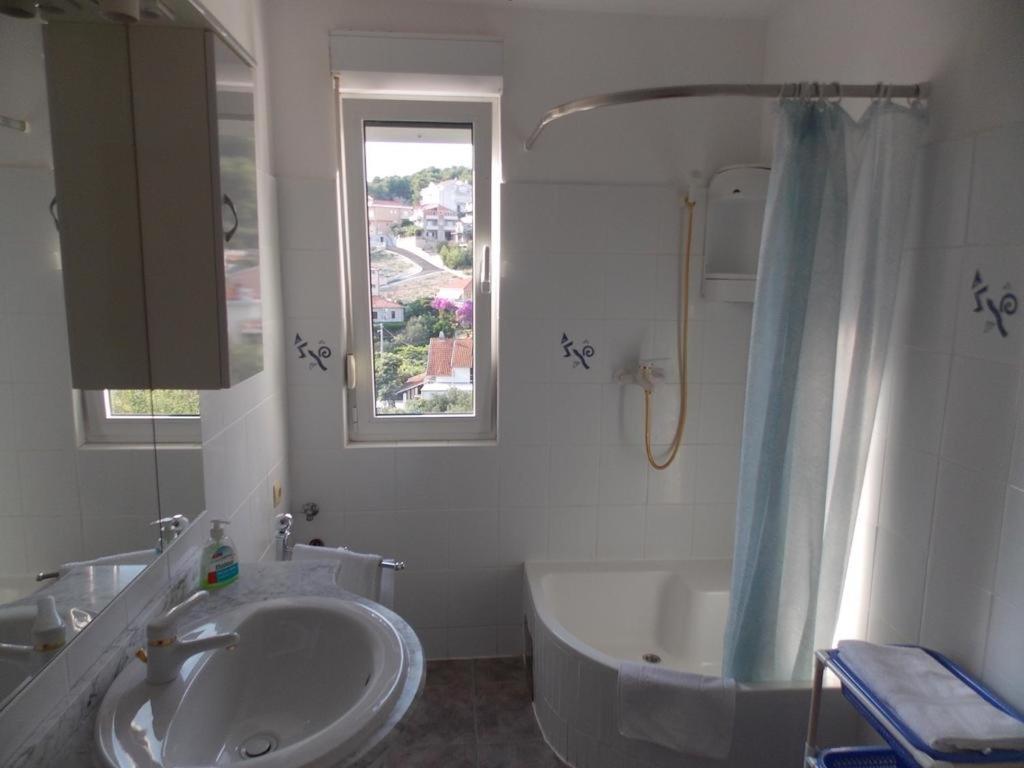 Kúpeľňa v ubytovaní Apartmenthouse Trogir (4236)