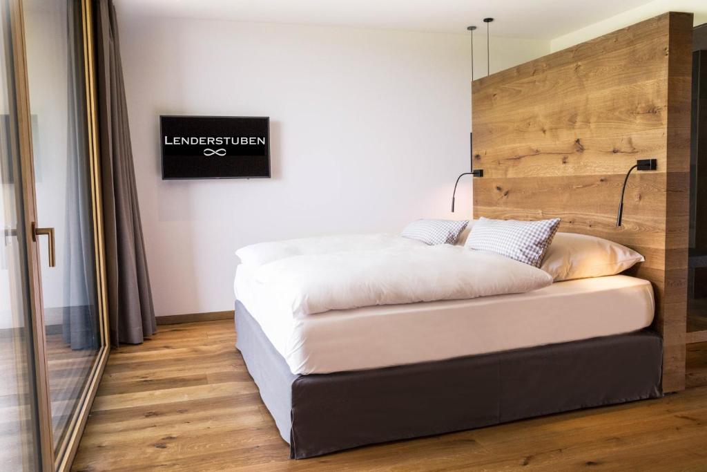 Postel nebo postele na pokoji v ubytování Hotel Lenderstuben