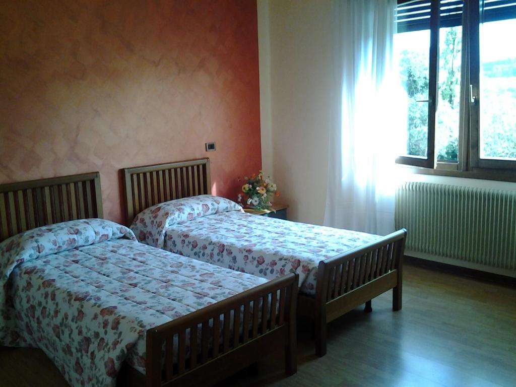 Postel nebo postele na pokoji v ubytování B&B La Palanca