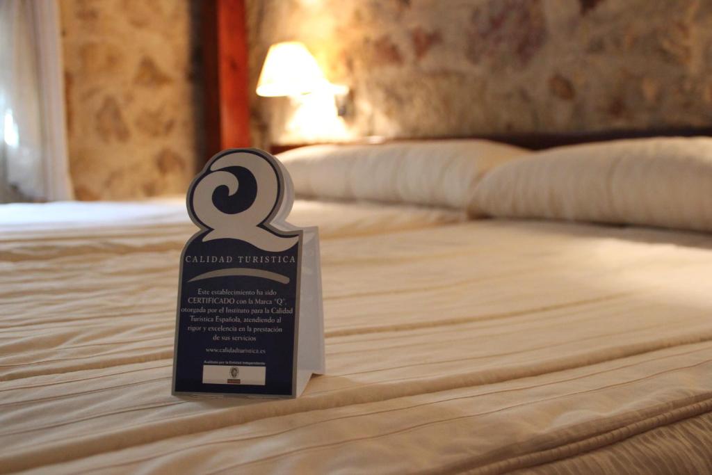 Postel nebo postele na pokoji v ubytování Hotel Microtel Placentinos