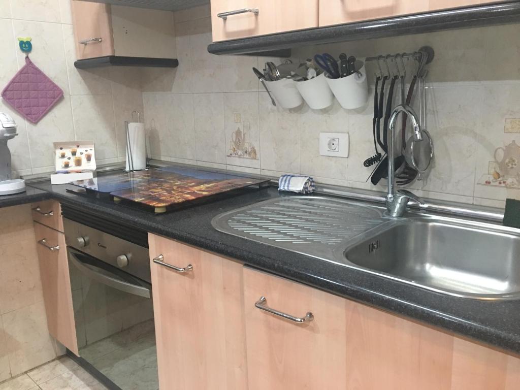 Kuchyň nebo kuchyňský kout v ubytování Vacacional Candelaria vistas al mar con garaje gratuito