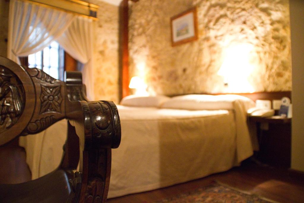 Postel nebo postele na pokoji v ubytování Hotel Microtel Placentinos
