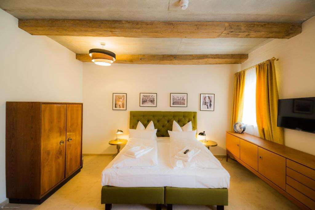Ліжко або ліжка в номері Hotel Luis Stadl