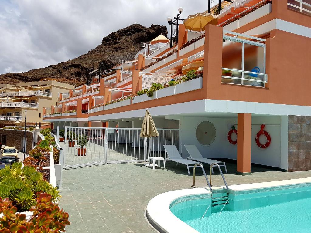 Bazén v ubytování Paraiso Puerto de Mogan nebo v jeho okolí