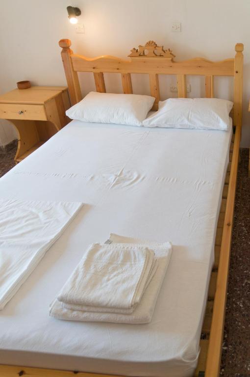 Postel nebo postele na pokoji v ubytování Anixi