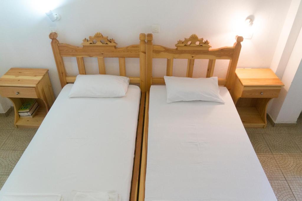 Postel nebo postele na pokoji v ubytování Anixi
