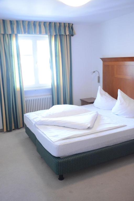 Postel nebo postele na pokoji v ubytování Hotel Tannerhof
