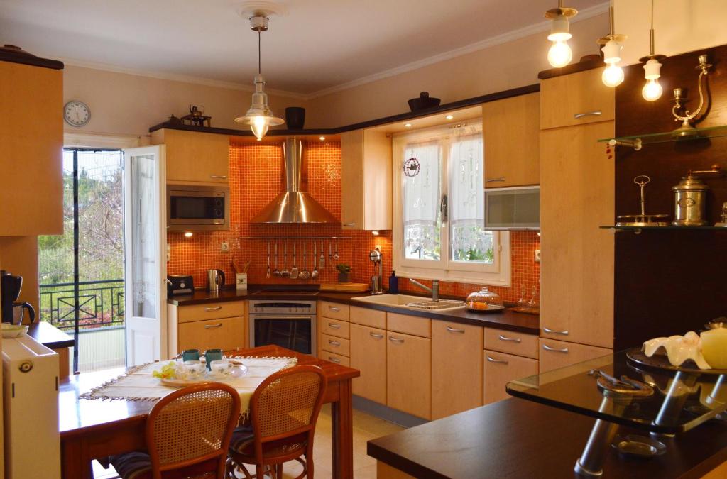 Kuchyň nebo kuchyňský kout v ubytování Araucaria Home