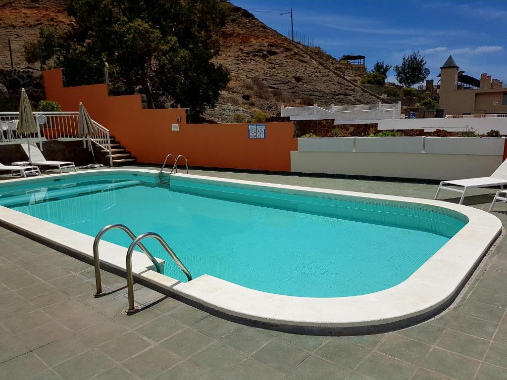 Bazén v ubytování Paraiso Puerto de Mogan nebo v jeho okolí
