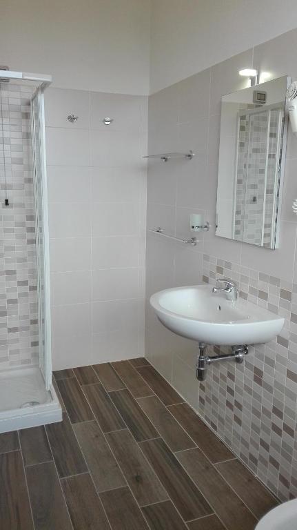 Koupelna v ubytování Albergo Rossana