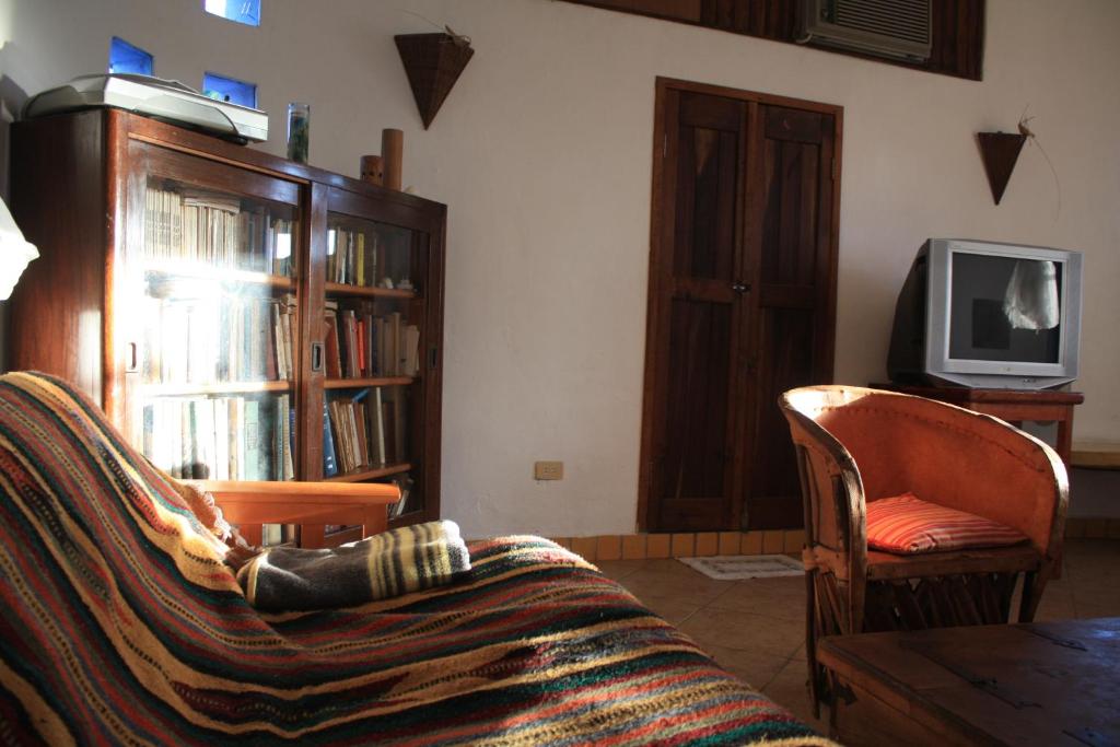 TV a/nebo společenská místnost v ubytování Amaranto Bed and Breakfast