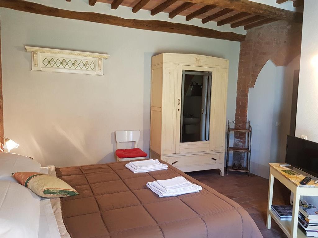 Posteľ alebo postele v izbe v ubytovaní B&B Palazzo a Merse