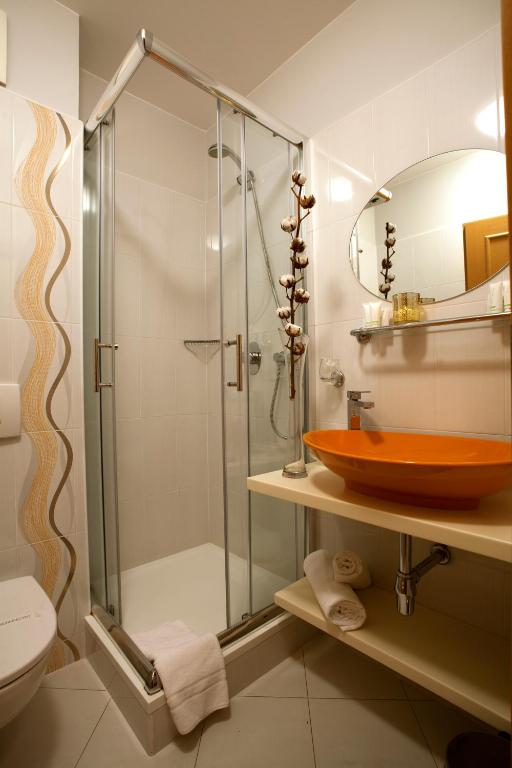 Koupelna v ubytování Hotel Ambiente Wellness & Spa