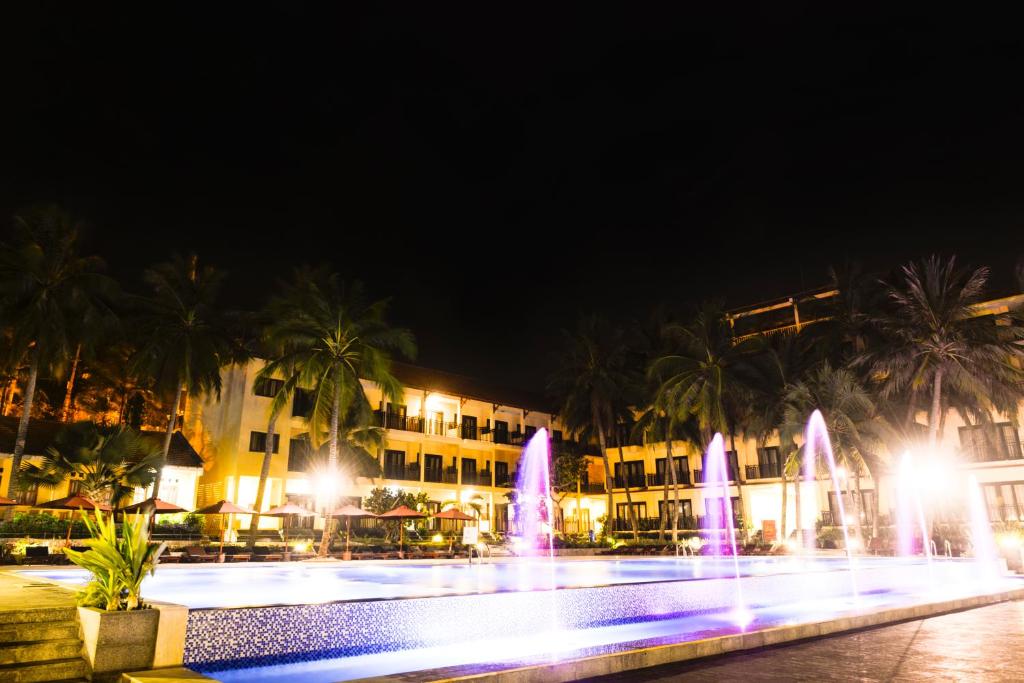 The swimming pool at or close to Hon Rom Central Beach Resort