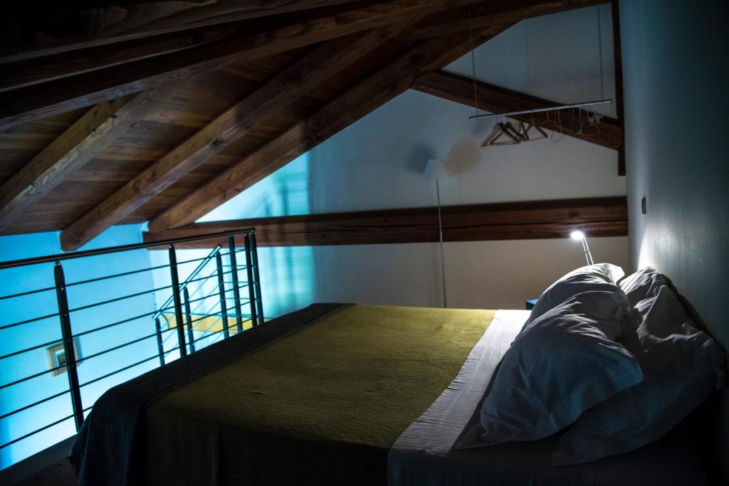 Postel nebo postele na pokoji v ubytování Casa Vacanze San Stefanetto
