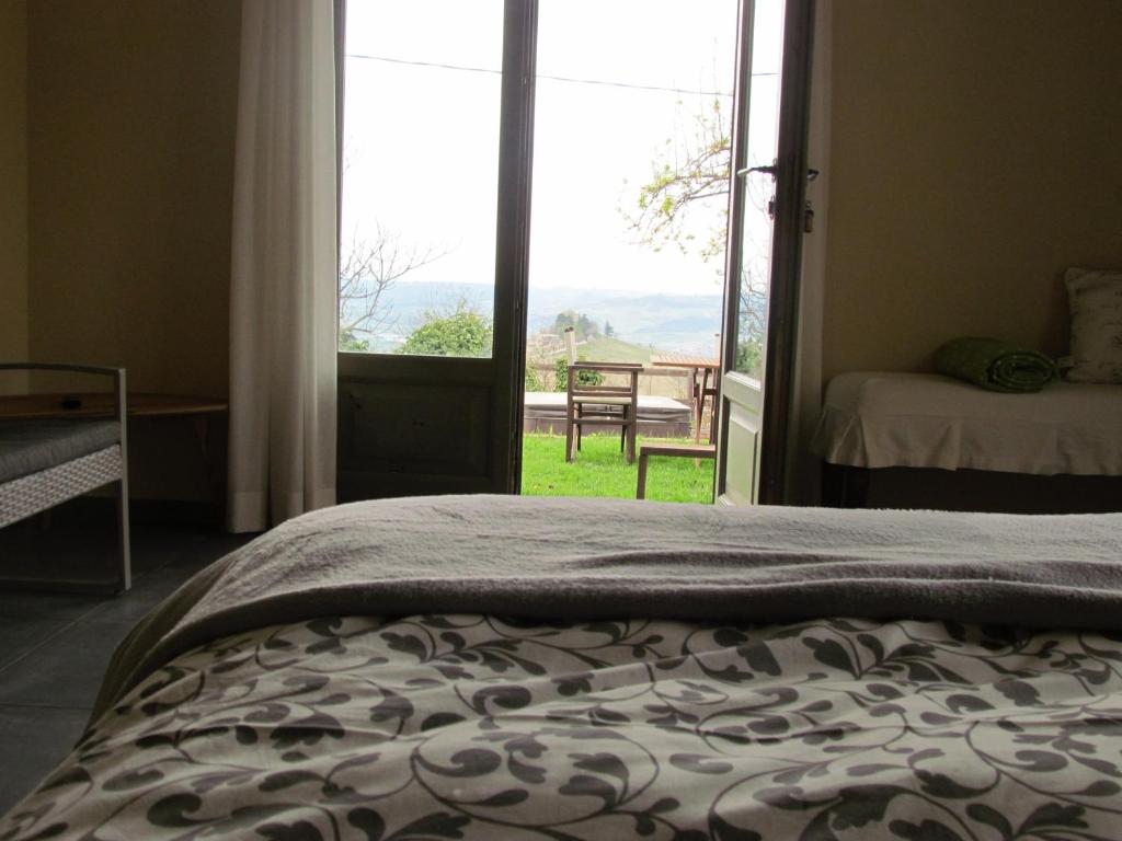 Postel nebo postele na pokoji v ubytování Casa Vacanze San Stefanetto