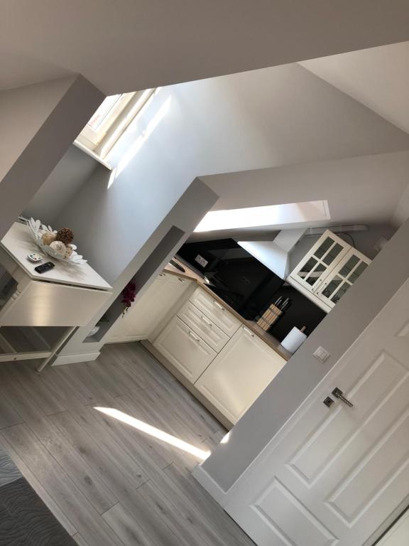 Kuchyňa alebo kuchynka v ubytovaní Apartament MnW