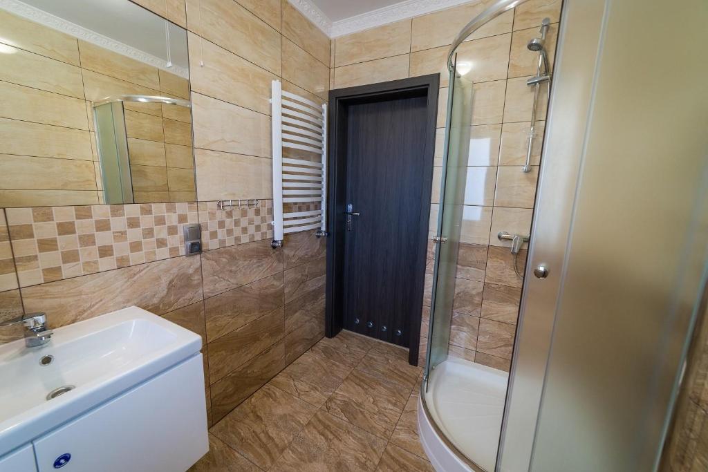 Kúpeľňa v ubytovaní Villa Mikołajki Popiełuszki 8