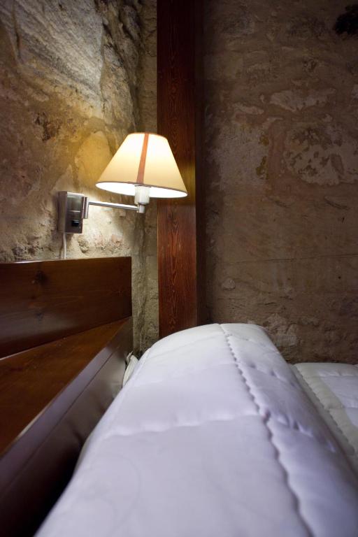 Postel nebo postele na pokoji v ubytování Hotel Microtel Placentinos