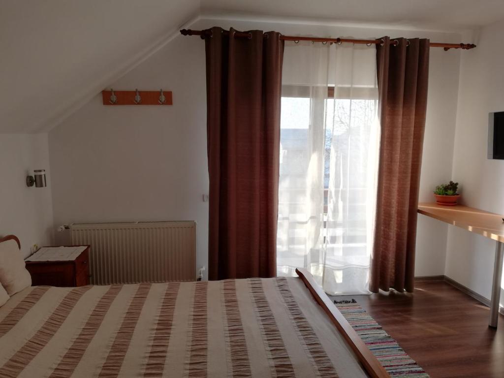 Letto o letti in una camera di Agropensiunea Ioana